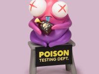 The Poison Testing Dept. vinyl figure on table